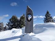 The memorial at the peak of the Paion is dedicated to Carlo Donei, ski instructor and founder of the Alpe Cermis Ski School