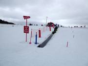 Practice slope with conveyor belt at the valley station