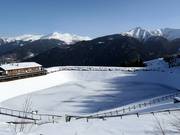 Storage pond for snowmaking
