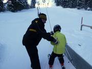 The staff assists with boarding