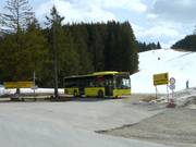 The village bus stops right at the slope