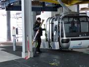 Skis are handed over at the gondola.