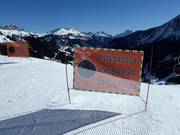 Warning notice on a difficult slope