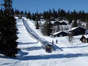 Covered conveyor belt as a feeder in the Høyfjellssenter