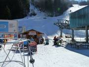Cozy snack bar at the valley station of the Rothausbahn