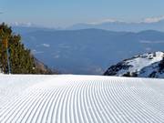 Perfect slope grooming in the Vogel ski resort
