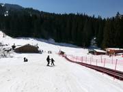 Long conveyor belt in the Ski Center Malina