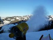 The snow cannons start up after the slopes have closed