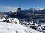 Dorfbahn Königsleiten I - 8pers. Gondola lift with seat heating (monocable circulating ropeway)