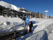 The bar is handed to you when you get on the drag lift.