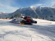 Grooming of the slopes