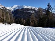 Freshly groomed slope in the Schwemmalm ski area