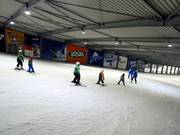 Children's ski course in the indoor ski hall