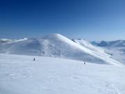 Untouched slopes await you when heliskiing