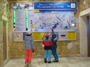 Information board with slope map at the Highport Flachauwinkl service valley station