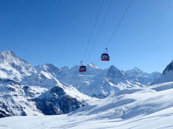 The modern Espace Weisshorn 10-person gondola lift travels up to the ski resort from Zinal