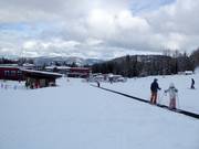 Practice slope with conveyor belt