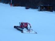 Snowcat at work in the ski resort of Savik Kuk