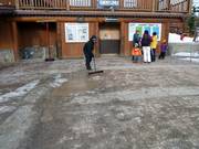 The staff cleans the floor