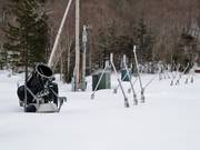 The snow cannons wait for their next job