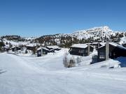 View of the holiday homes at the edge of the slope