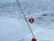 Slope numbers are attached to the snow guns