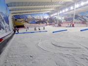 Practice slope with conveyor belts for the kids