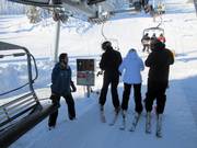 The staff always assists when boarding the chairlifts.