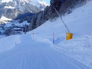 Snowmaking with snow lances on the valley run to Engelberg