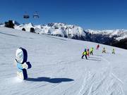 Children's ski course on the easy Goldseepiste