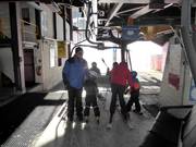 Children are assisted with boarding at the chairlifts