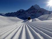 Perfectly groomed slopes in the ski resort of First