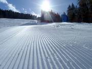 Groomed slope in the Tirolina ski resort