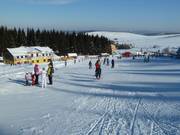Beginner slope at the valley station of the 3-seater chairlift Dámska