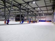 Practice slope with conveyor belt