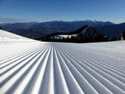 Perfectly groomed slope in the Monte Bondone ski area
