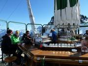 When the sun is shining, people enjoy being topless.