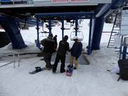 The friendly staff scans the ski pass.