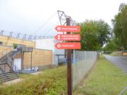 Signposts in front of the ski hall