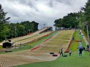 View of the entire dry ski area with the tubing track