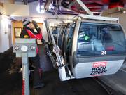 Skis are handed over at the gondola lift.