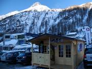 Office of one of the heliski companies at the parking lot in Stafal.