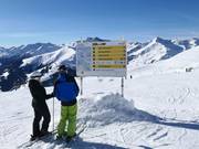 Signposting with piste map at Rastkogel