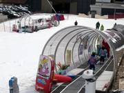 Conveyor belts of the ski school at the valley station