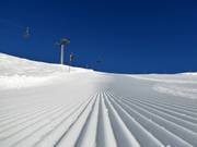 Perfect slope preparation in the ski resort of Belalp