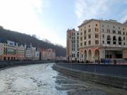 The Park Inn is located on the left side of the river, right next to the valley station.