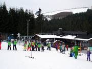 Once the snowplow turn works, it's time to head to the main lift.