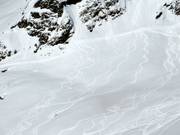 Ungroomed, unsecured ski terrain