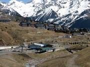 Valley station of the Sallent chairlift with the village of Formigal in the background