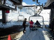 Assistance is provided when boarding the chairlift.